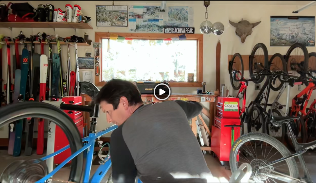 Robb fixing a bike in the workshop