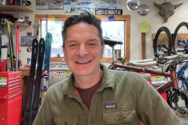 Robb in his workshop smiling at the camera