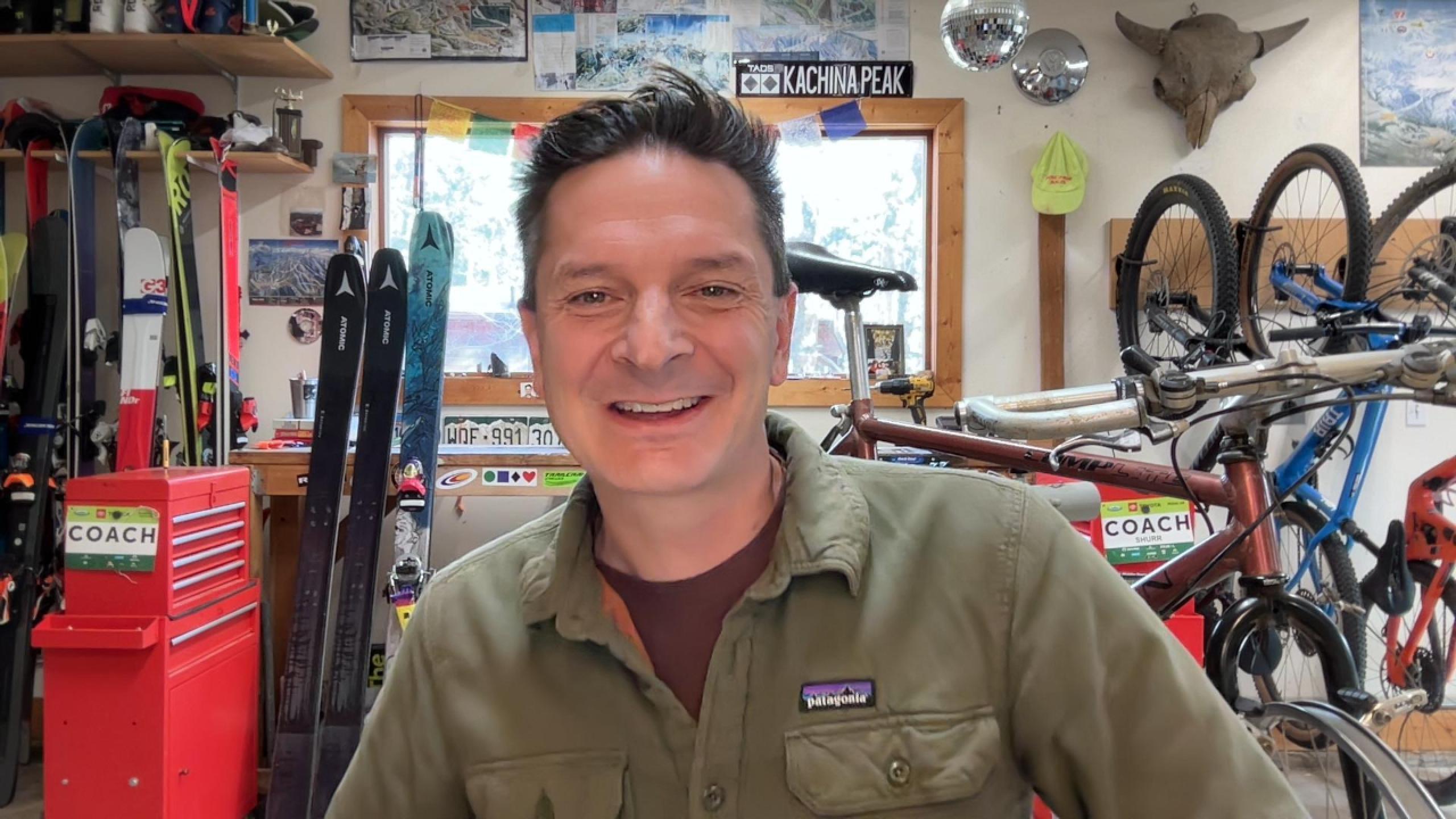 Robb in his workshop smiling at the camera